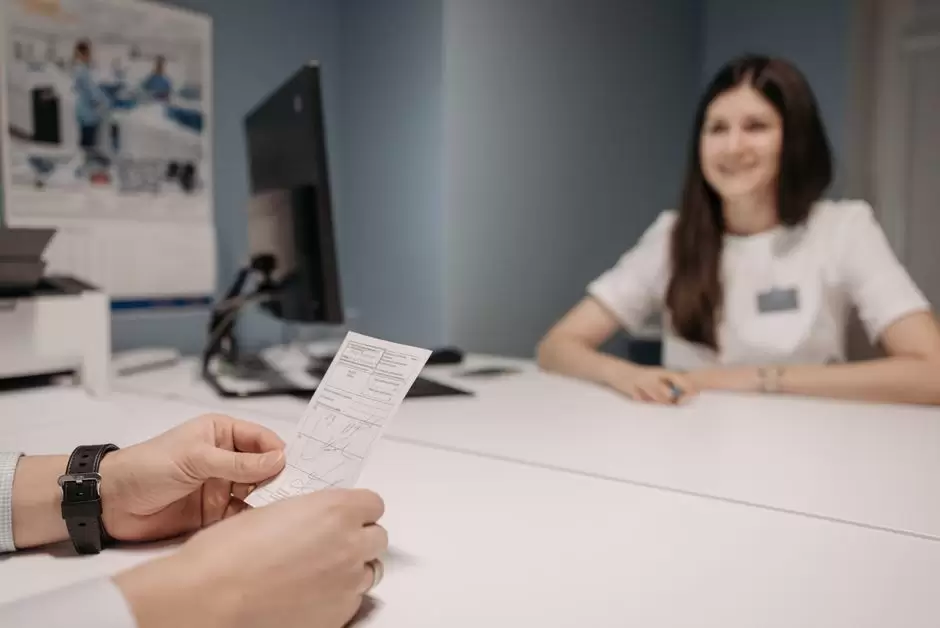 Doctor discussing a prescription with a patient during a medical consultation