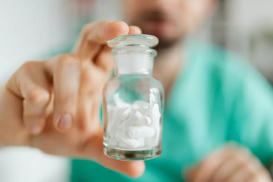 Doctor discussing oxycodone prescription for chronic pain management with a patient