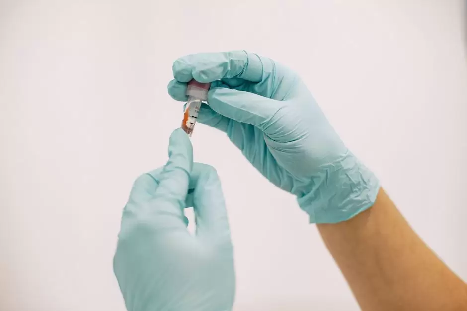 Lab technician reviewing a urine drug test sample for oxycodone screening