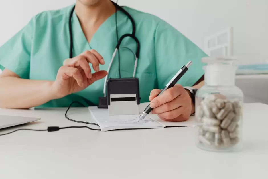 Pain management doctor discussing an oxycodone prescription with a patient