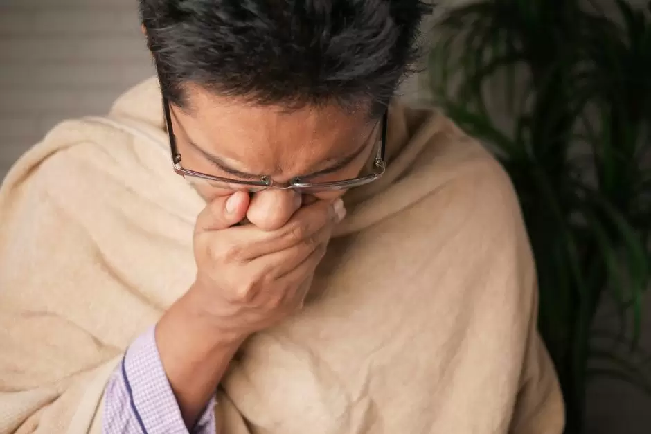 Person experiencing early signs of oxycodone withdrawal such as chills and discomfort