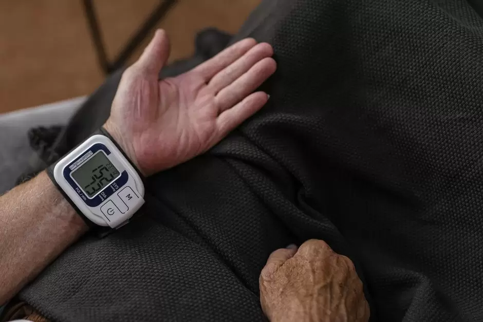 Person checking blood pressure reading while taking oxycodone medication